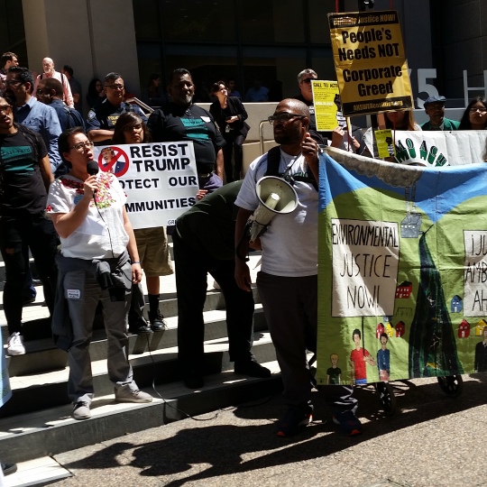 VIP speaks at an Earth Day rally with hundreds of others Environmental Justice activists at the US-EPA building in SF, 2017